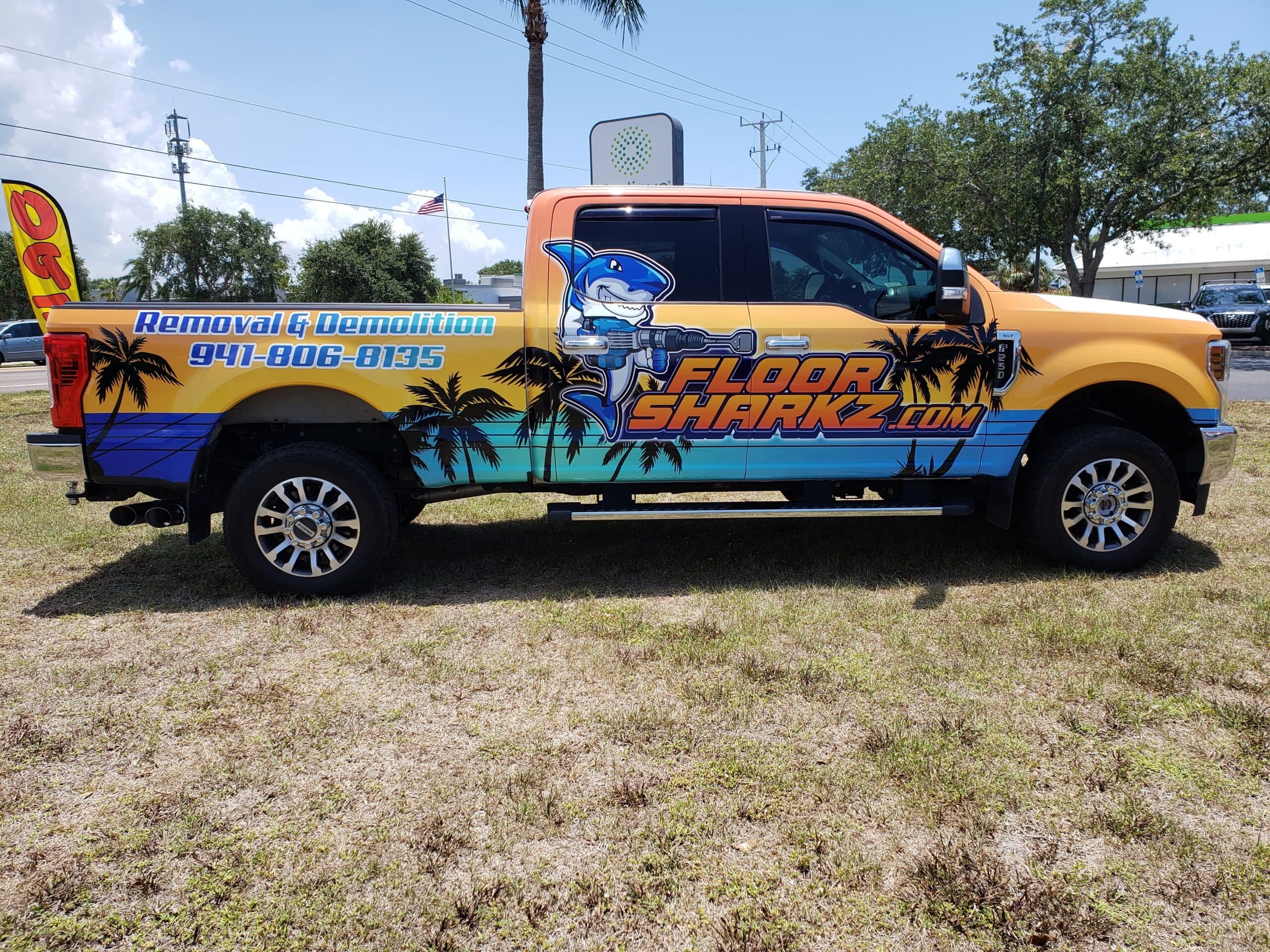 Full custom truck wrap with vibrant graphics by Auto Trim Design