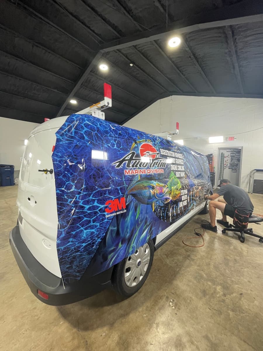 Ford Transit Connect after full Auto Trim Marine Division wrap
