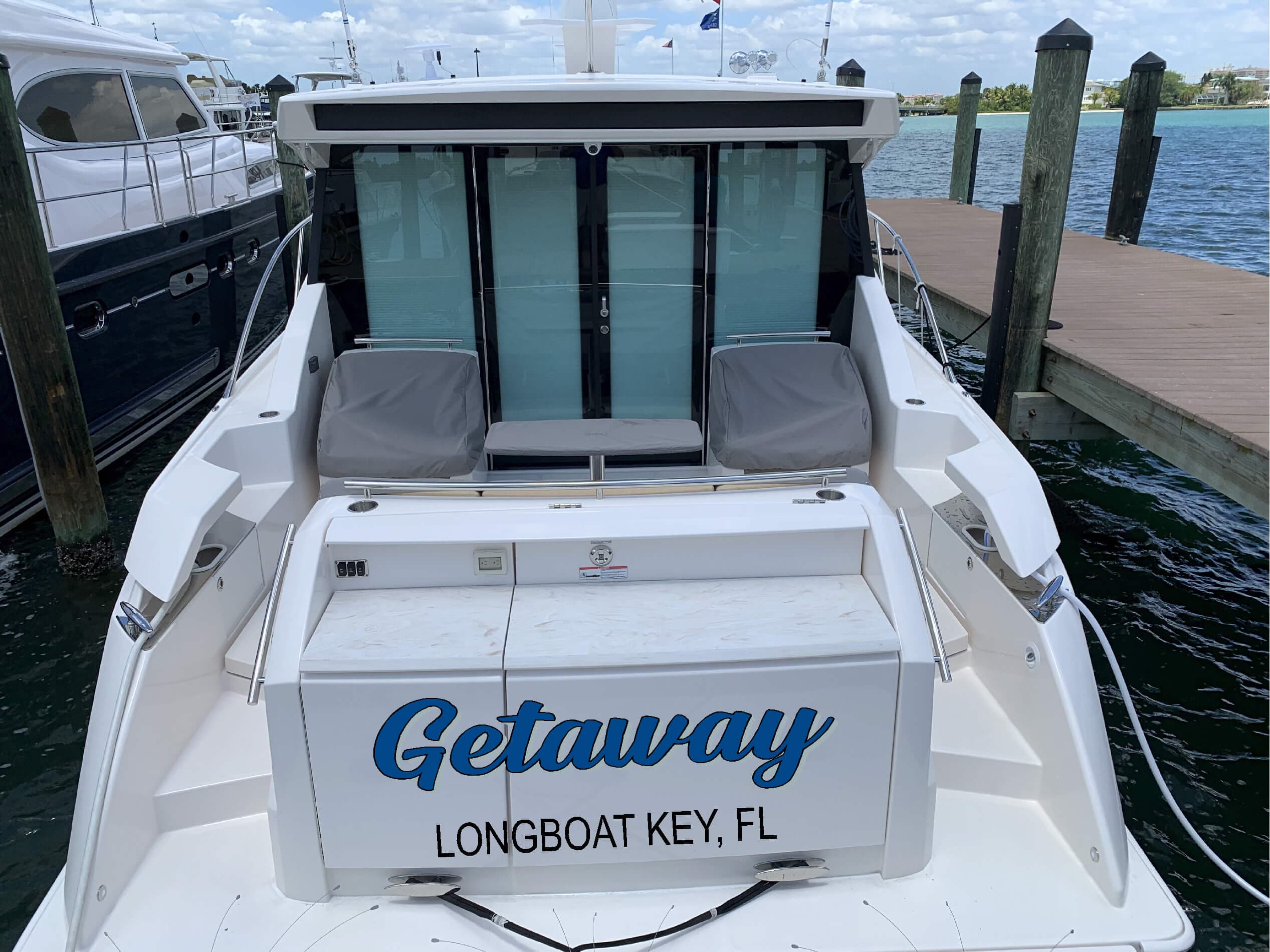 Custom boat graphics engine cowling by Auto Trim Design Bradenton
