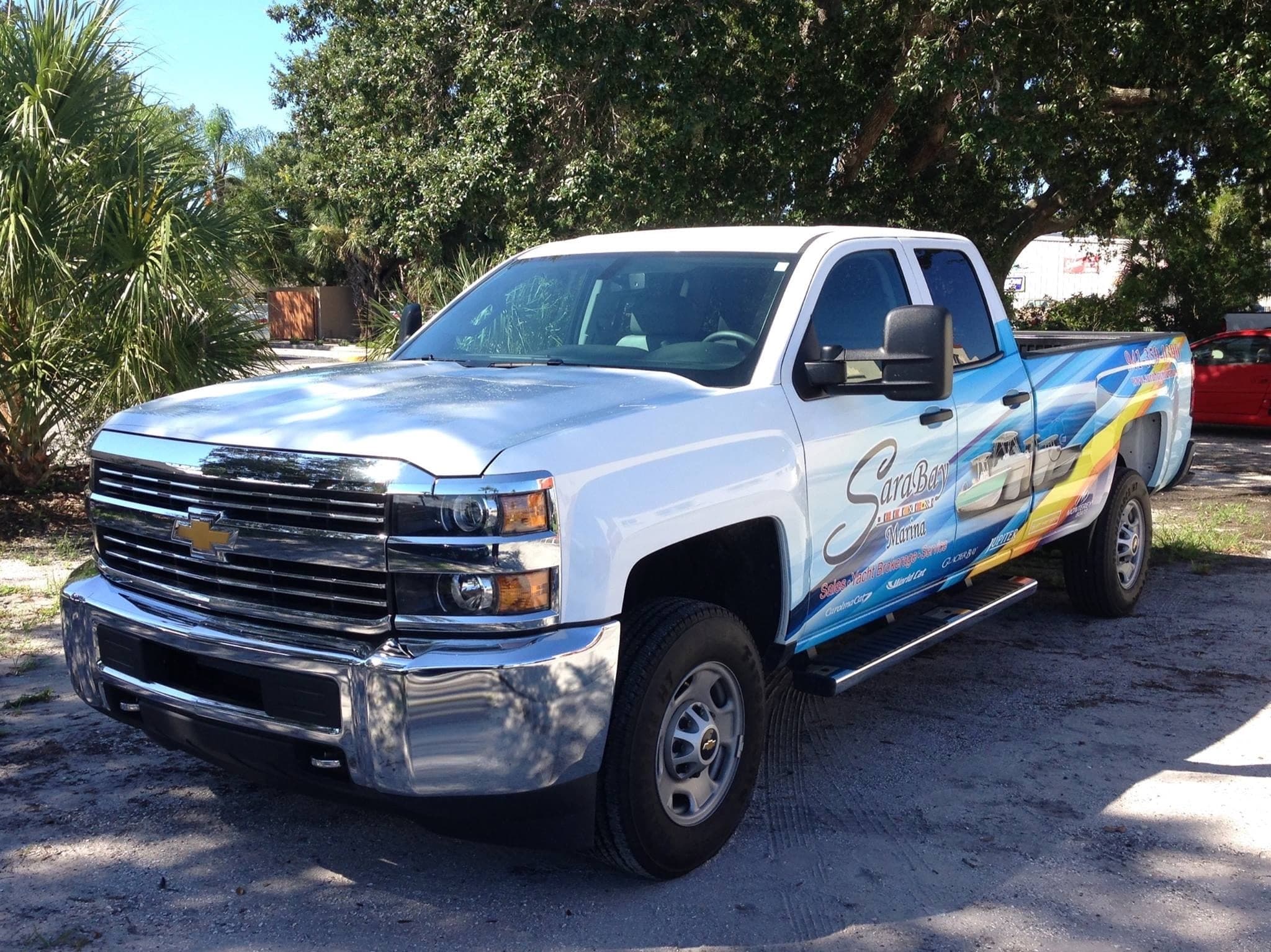 Custom vinyl graphics on Ram by ATD Suncoast