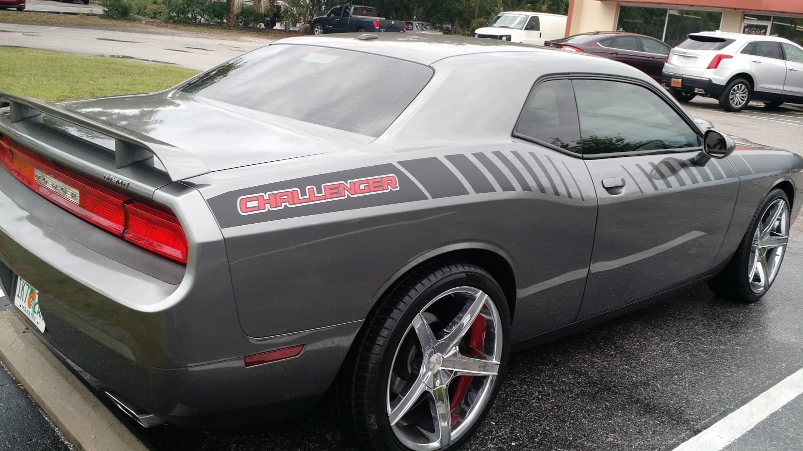 Custom vinyl graphics on custom vehicle by ATD Suncoast