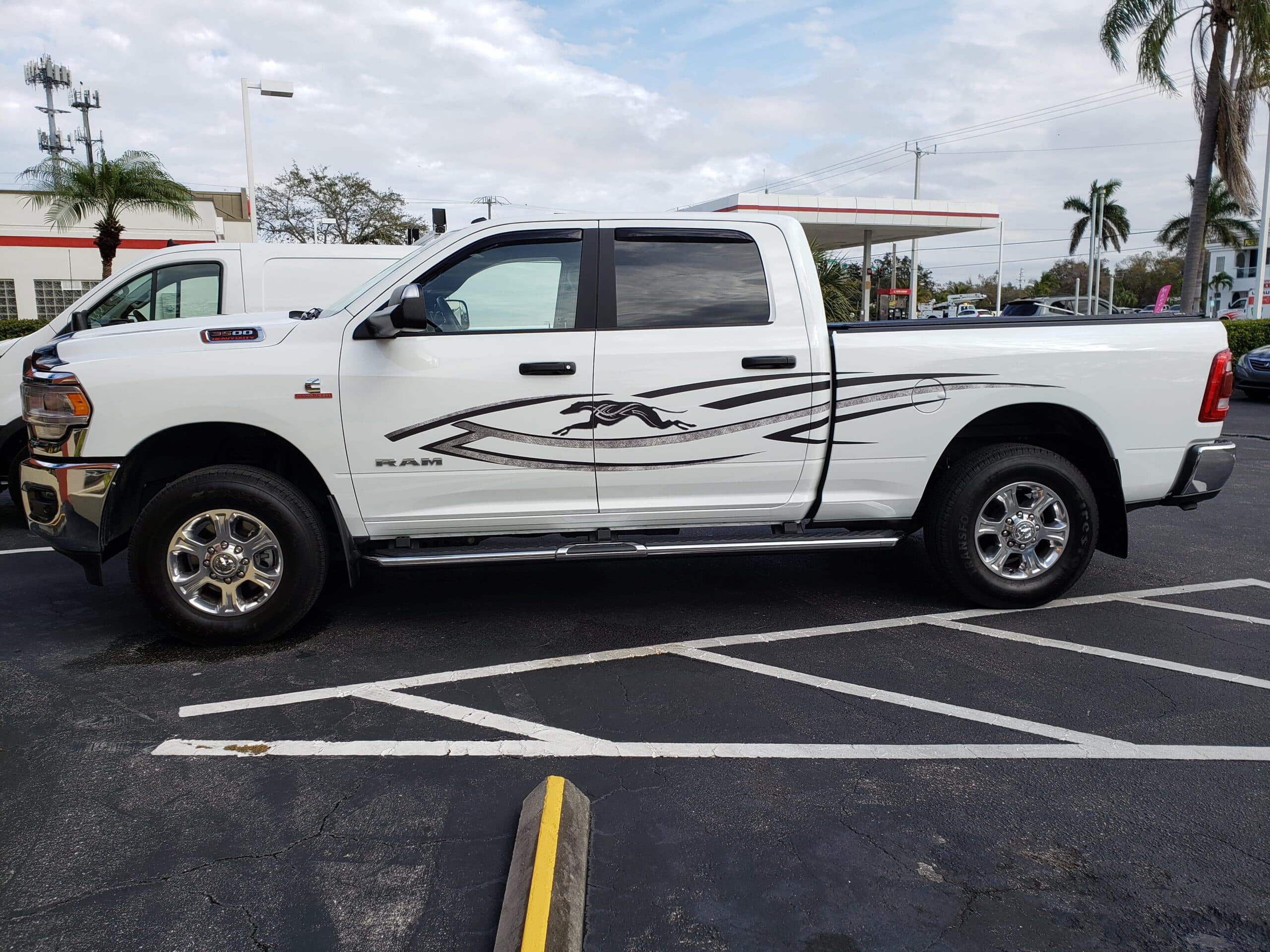 Custom vinyl graphics on custom vehicle by ATD Suncoast
