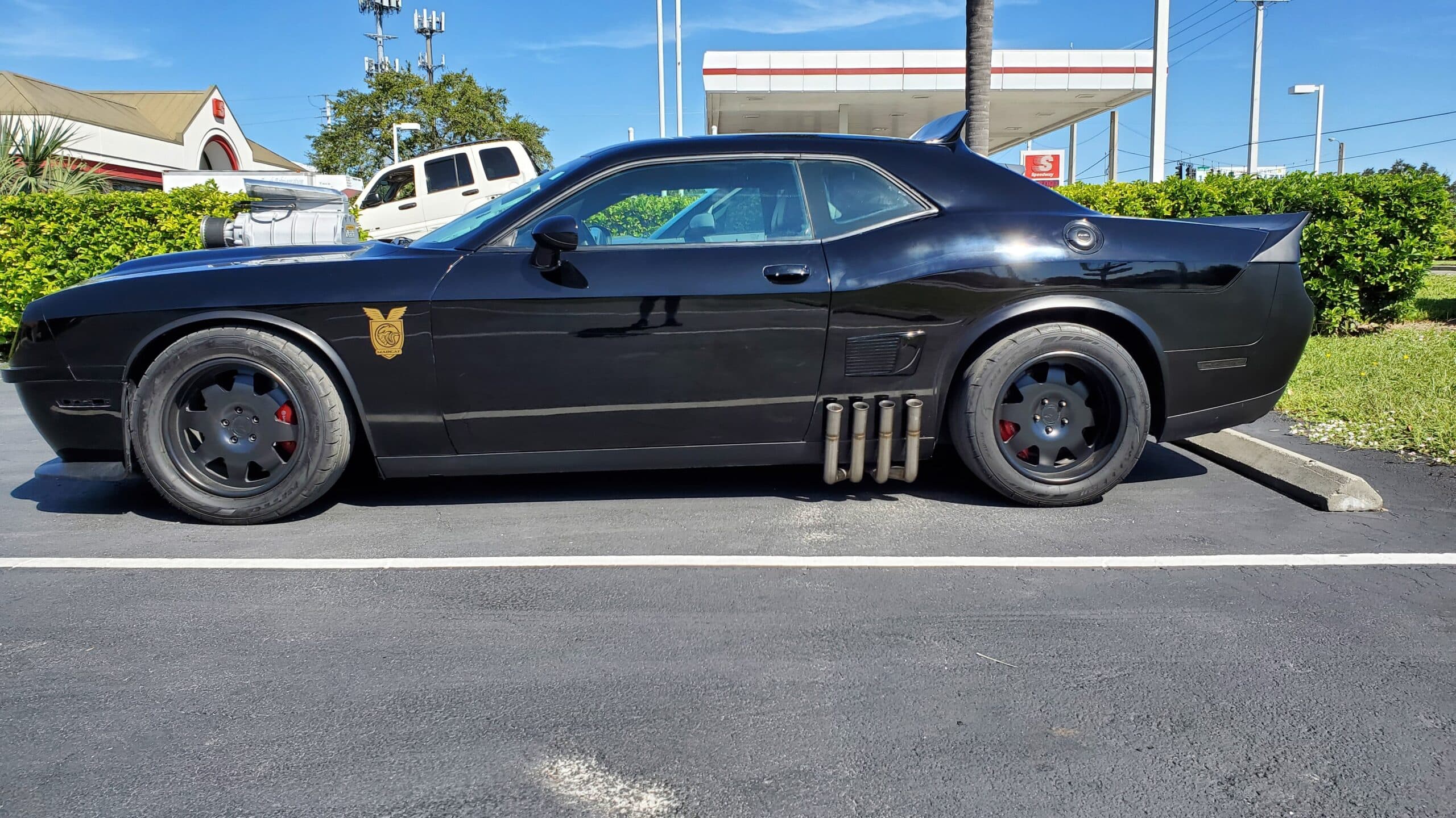 Custom vinyl graphics on custom vehicle by ATD Suncoast