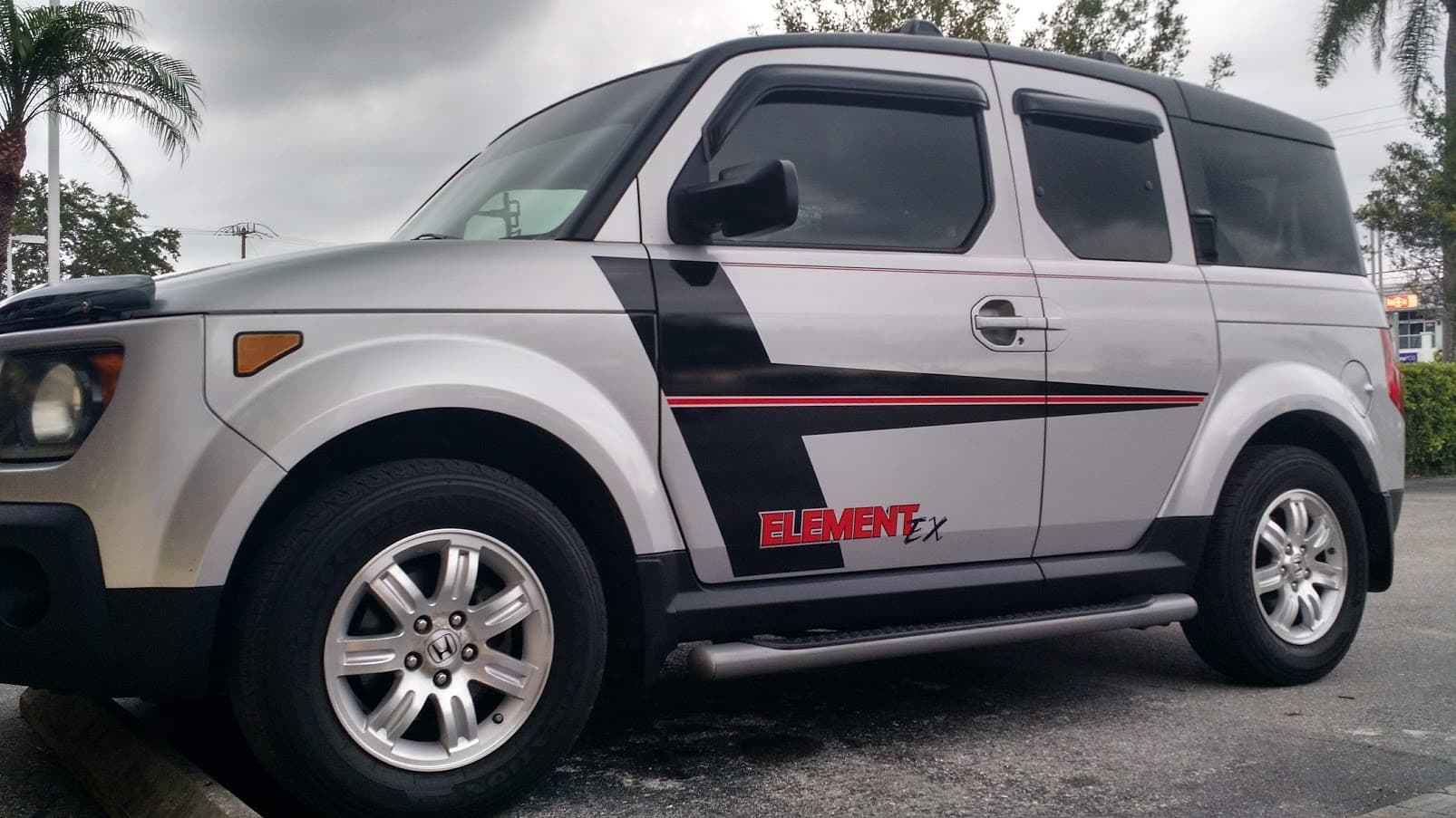 Custom vinyl graphics on custom vehicle by ATD Suncoast