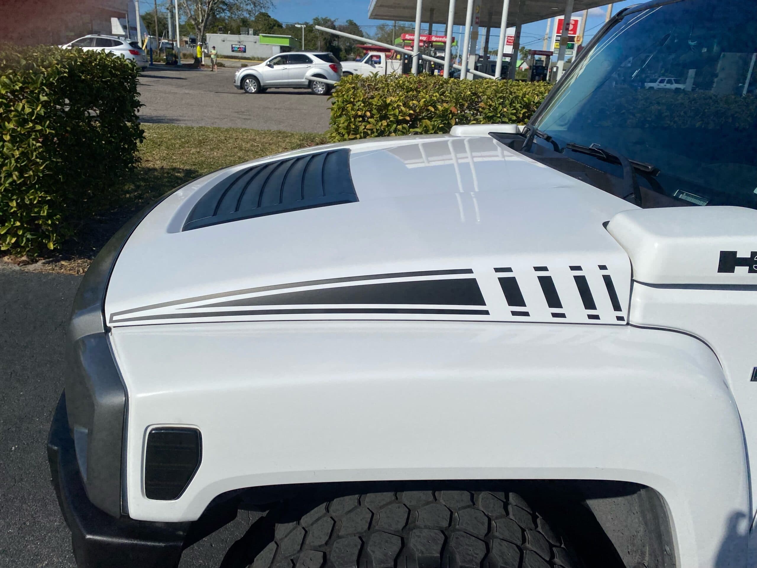 Custom vinyl graphics on custom vehicle by ATD Suncoast