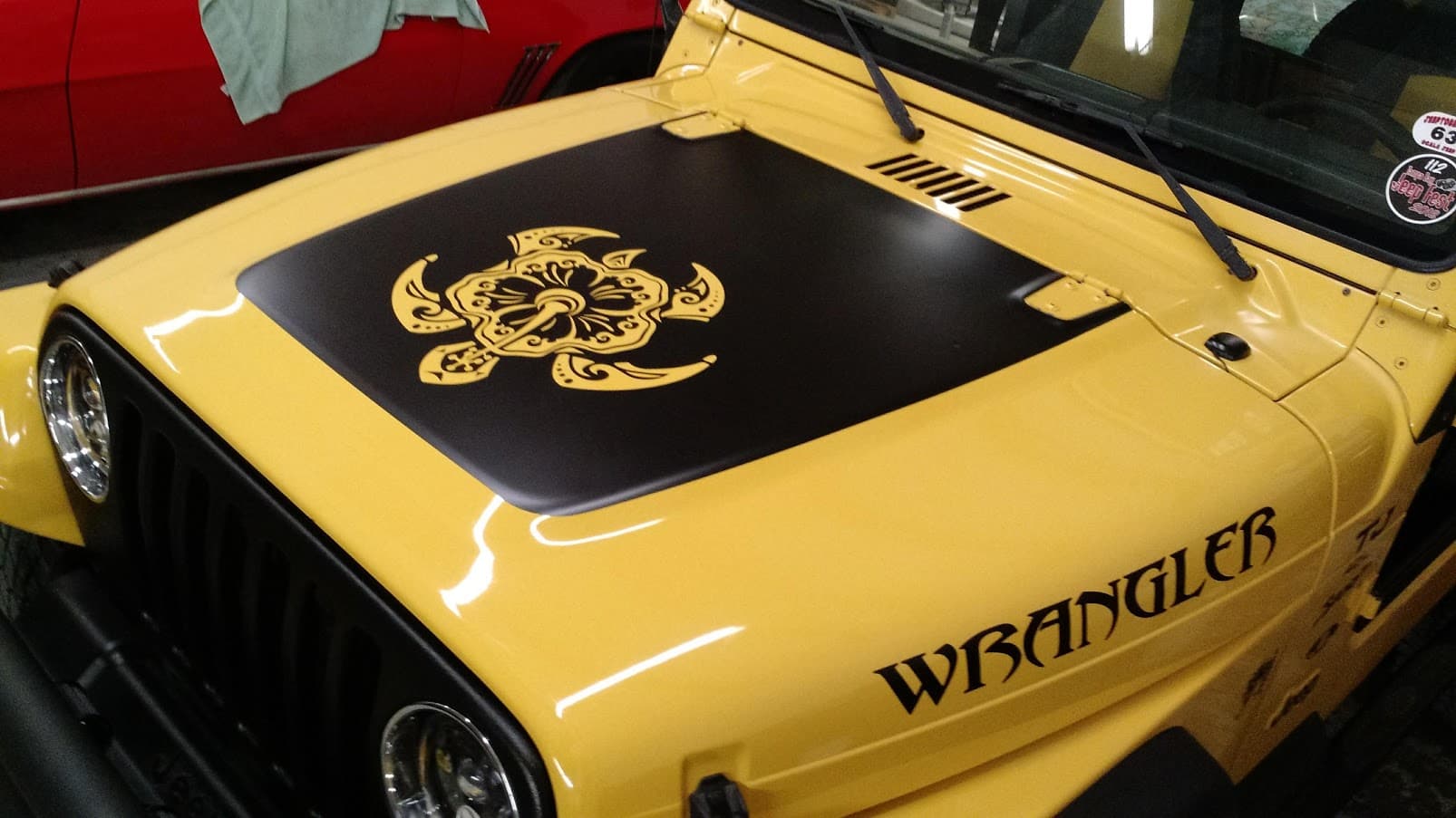 Custom vinyl graphics on custom vehicle by ATD Suncoast