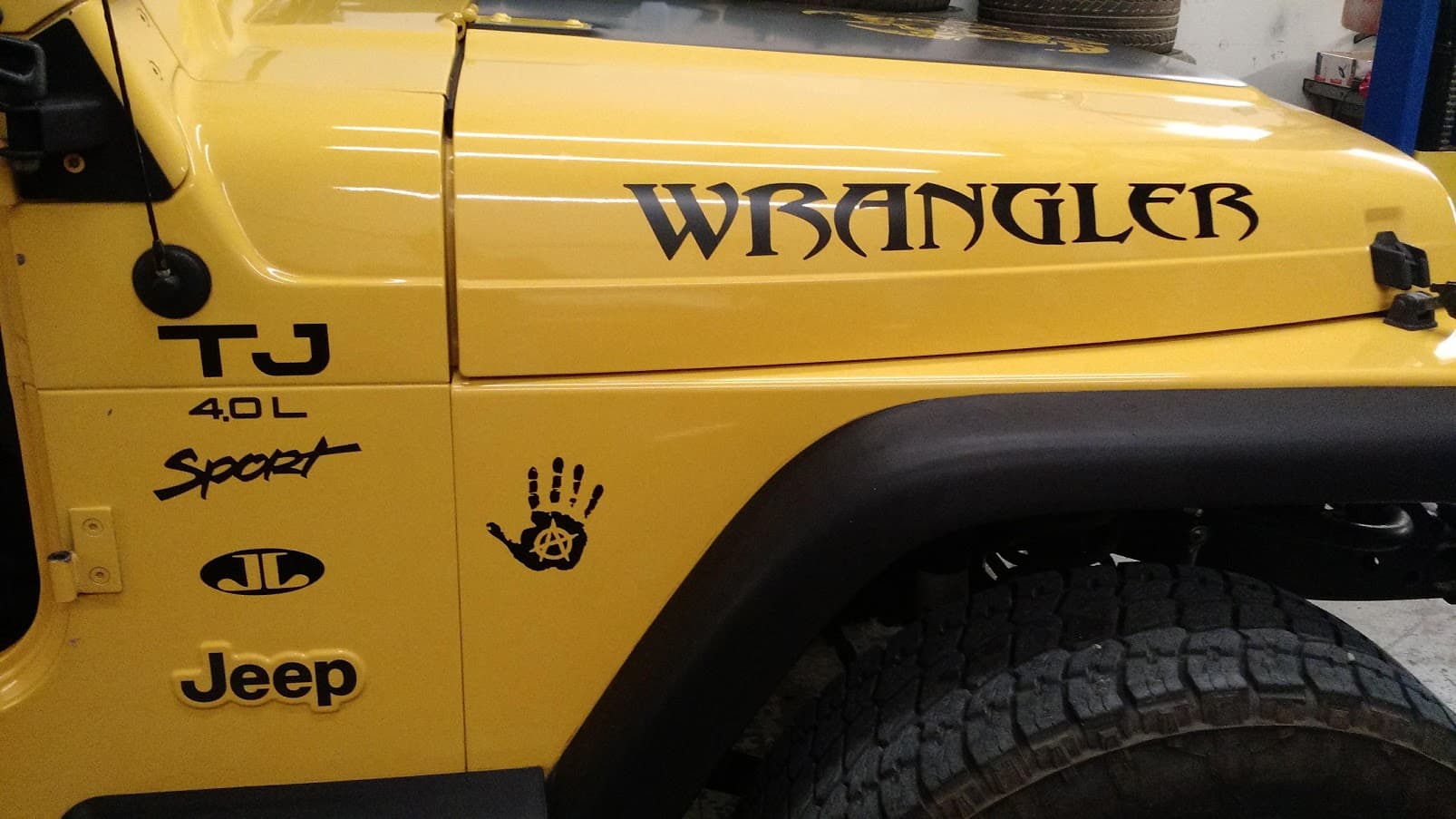 Custom vinyl graphics on custom vehicle by ATD Suncoast