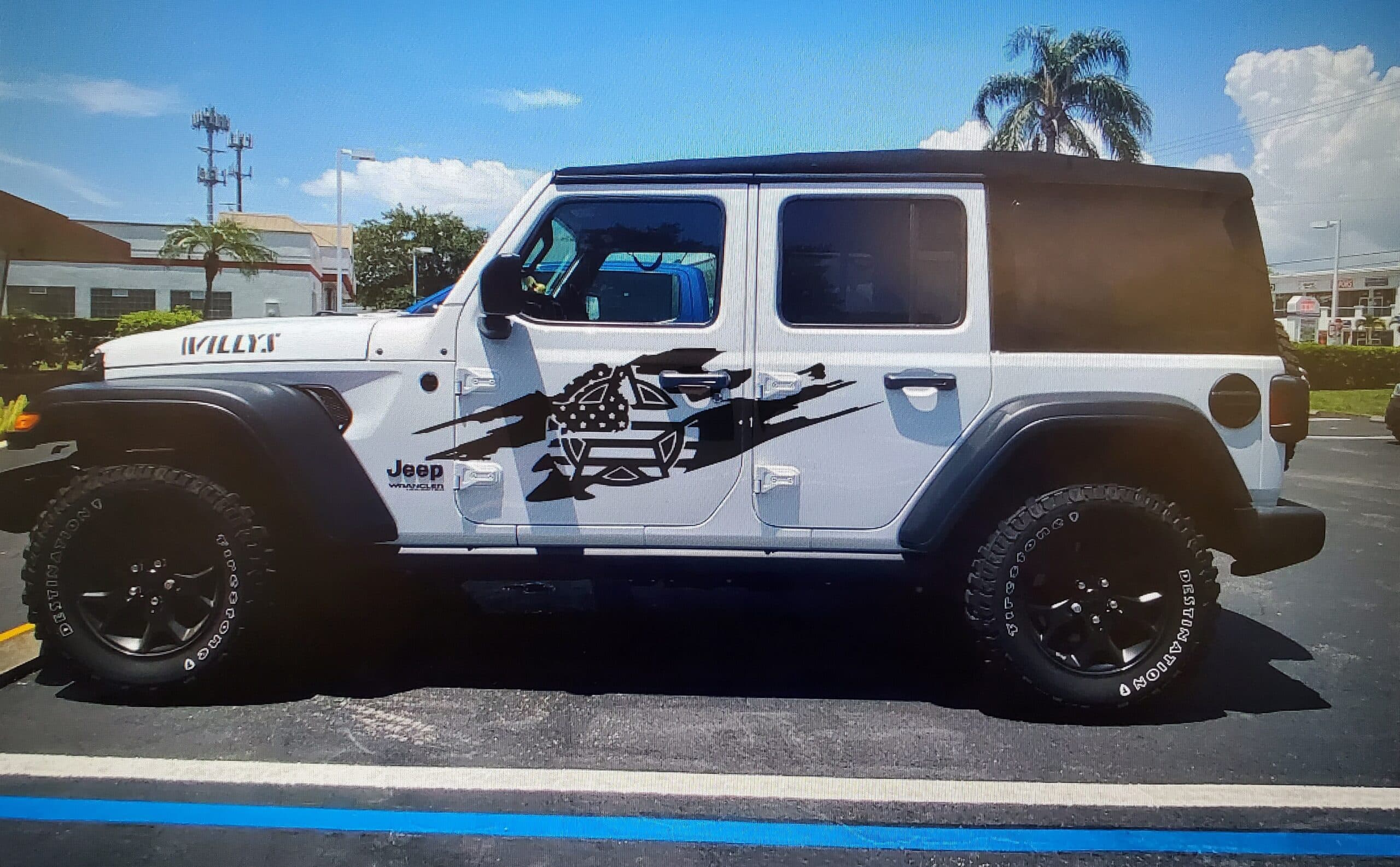 Custom vinyl graphics on custom vehicle by ATD Suncoast