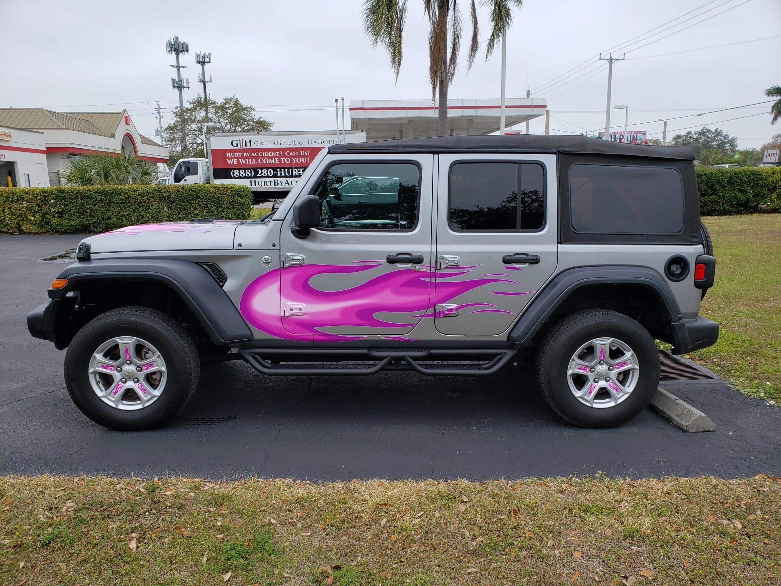 Custom vinyl graphics on custom vehicle by ATD Suncoast