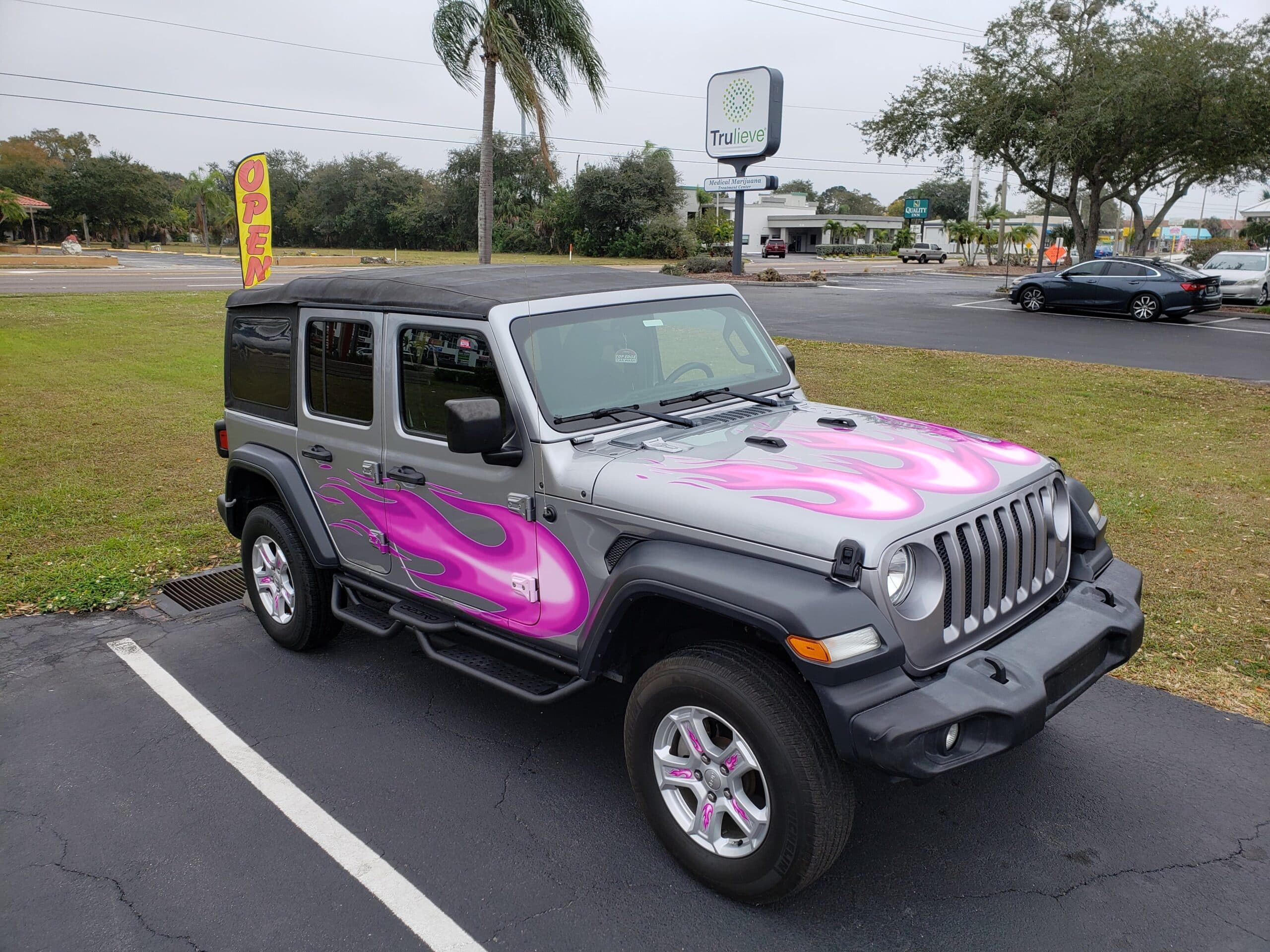 Custom vinyl graphics on custom vehicle by ATD Suncoast