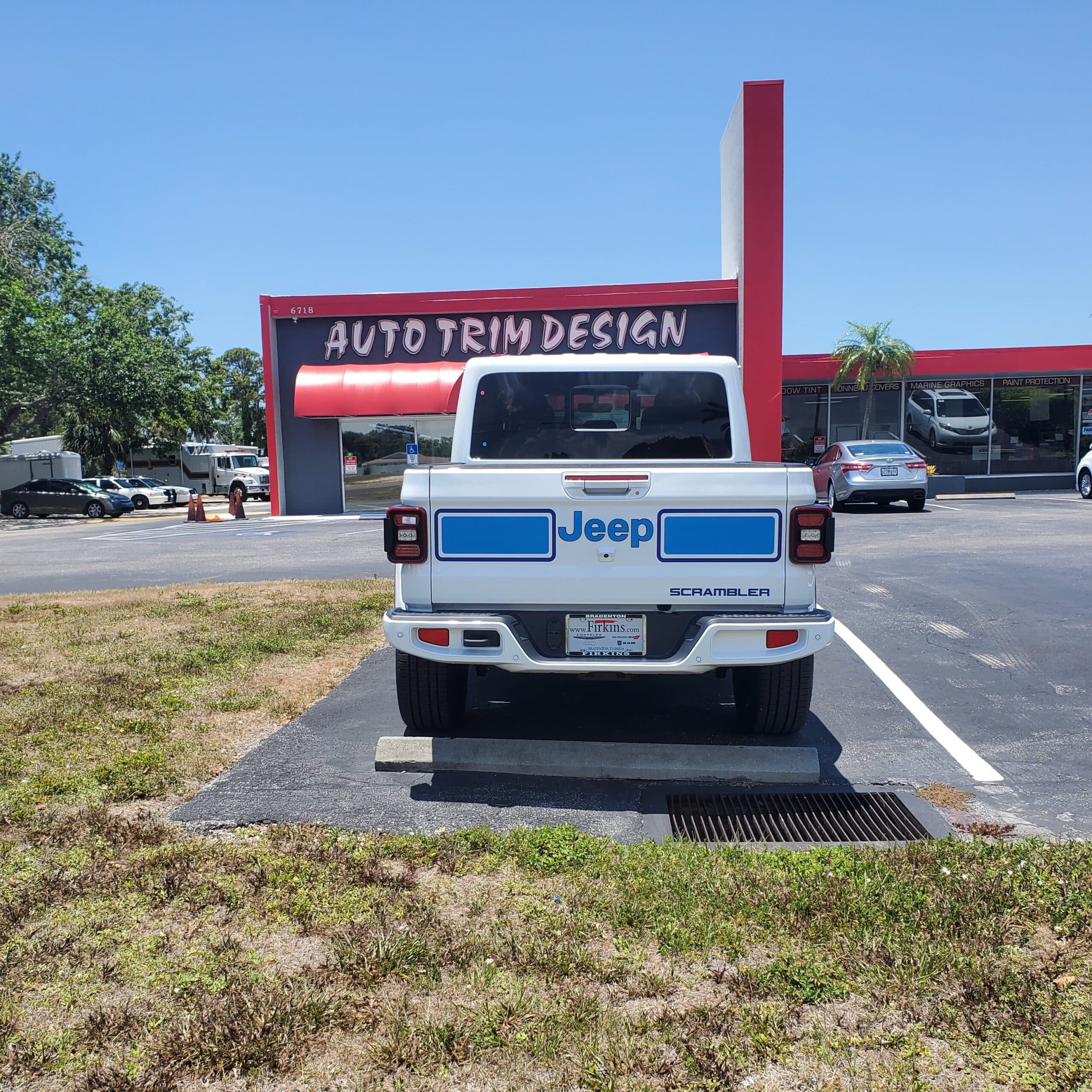 Custom vinyl graphics on custom vehicle by ATD Suncoast