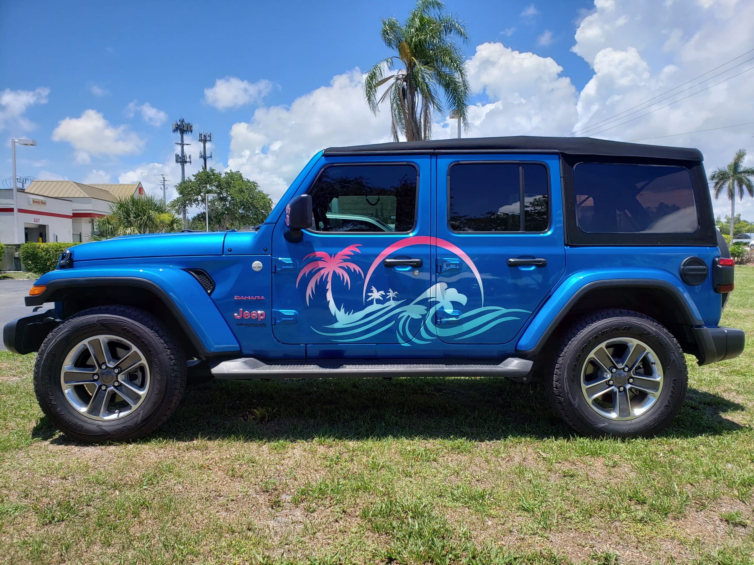 Custom vinyl graphics on custom vehicle by ATD Suncoast