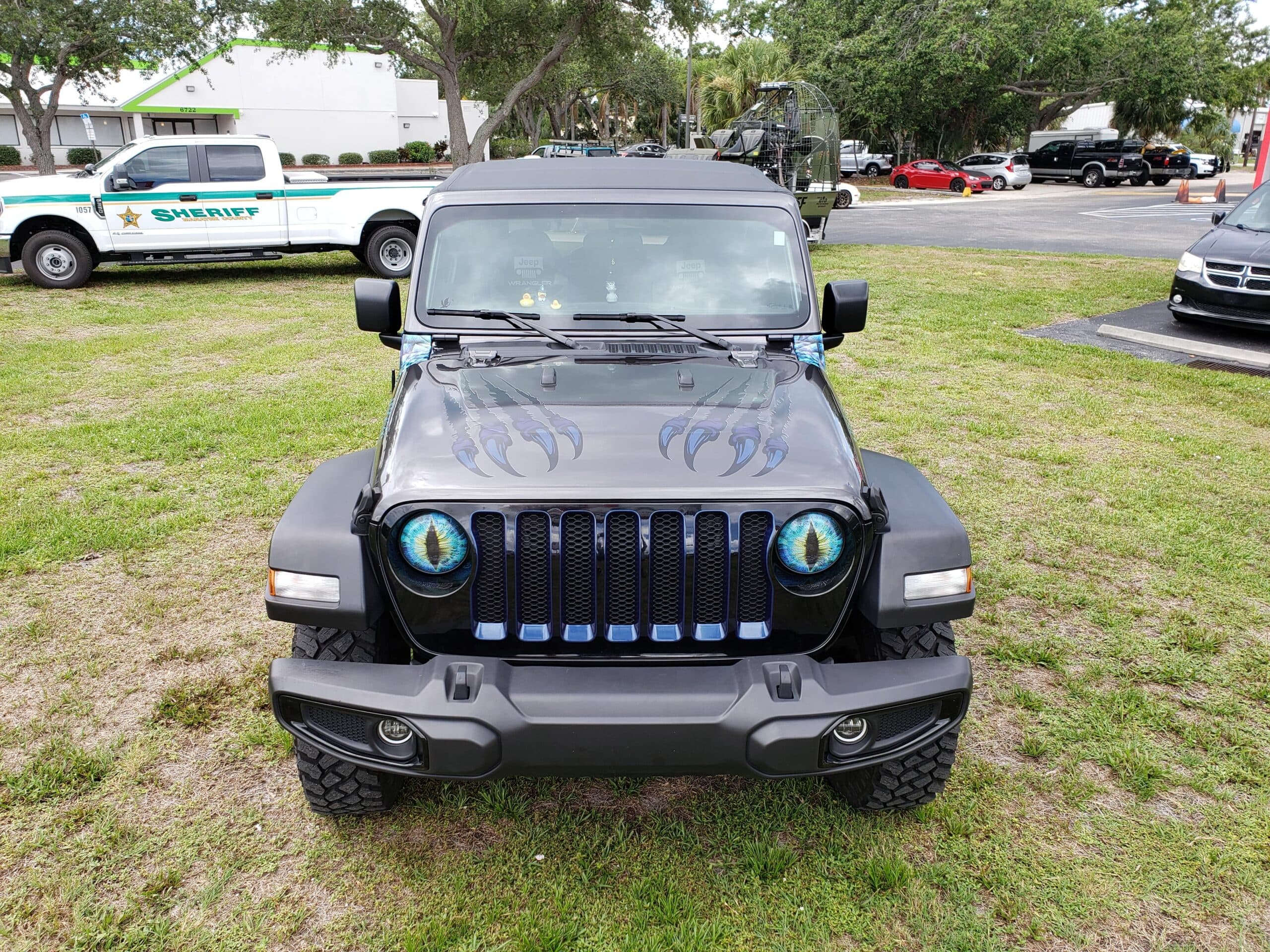 Custom vinyl graphics on custom vehicle by ATD Suncoast