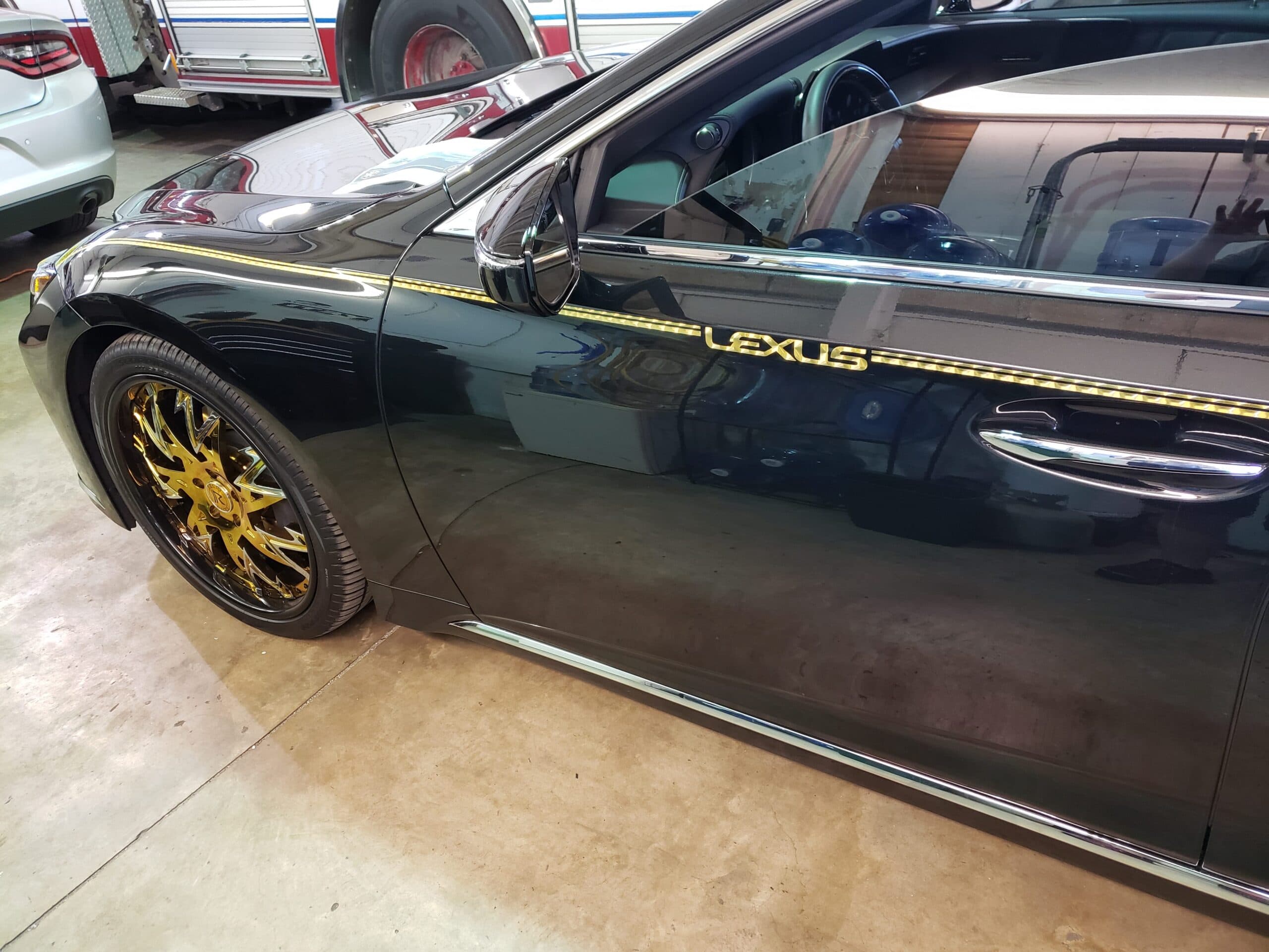 Custom vinyl graphics on custom vehicle by ATD Suncoast