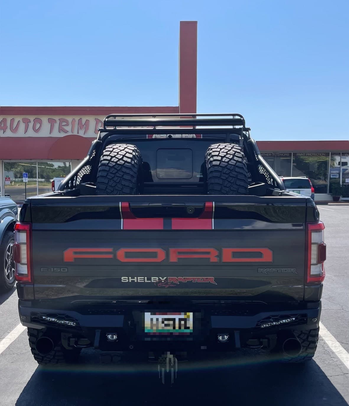 Custom vinyl graphics on custom vehicle by ATD Suncoast