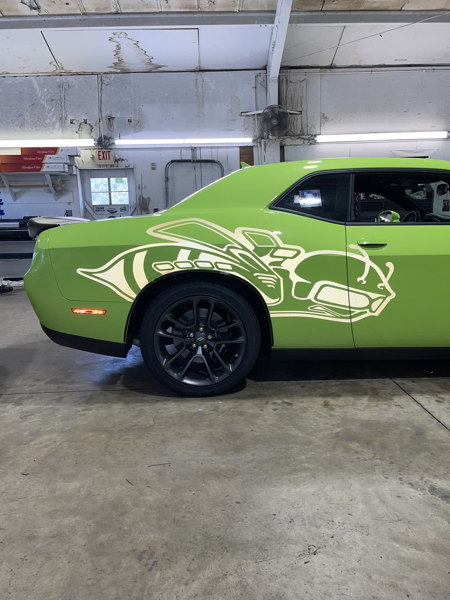 Custom vinyl graphics on custom vehicle by ATD Suncoast