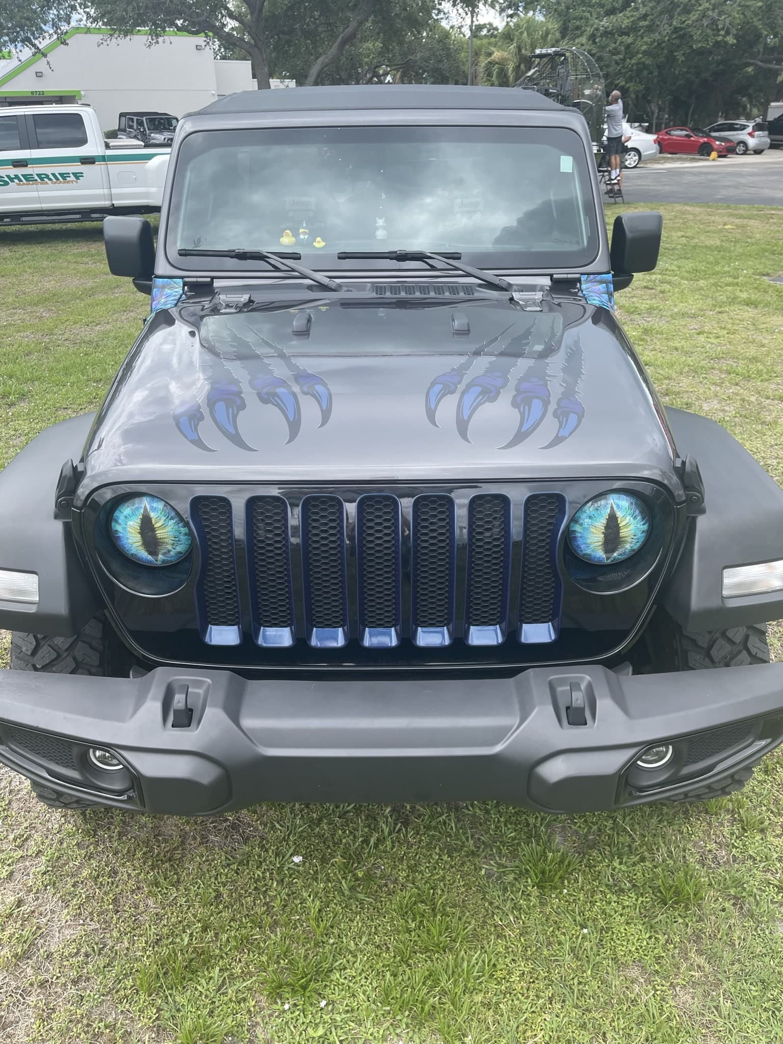 Custom vinyl graphics on custom vehicle by ATD Suncoast