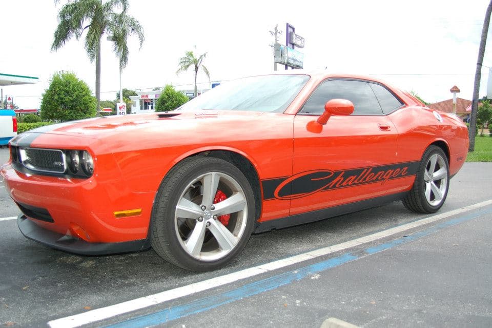 Custom vinyl graphics on custom vehicle by ATD Suncoast