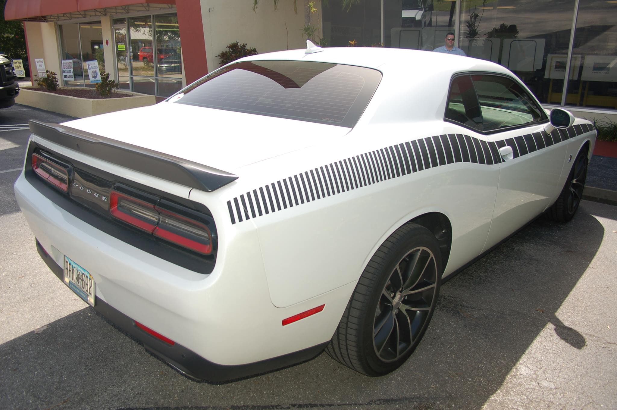 Custom vinyl graphics on custom vehicle by ATD Suncoast