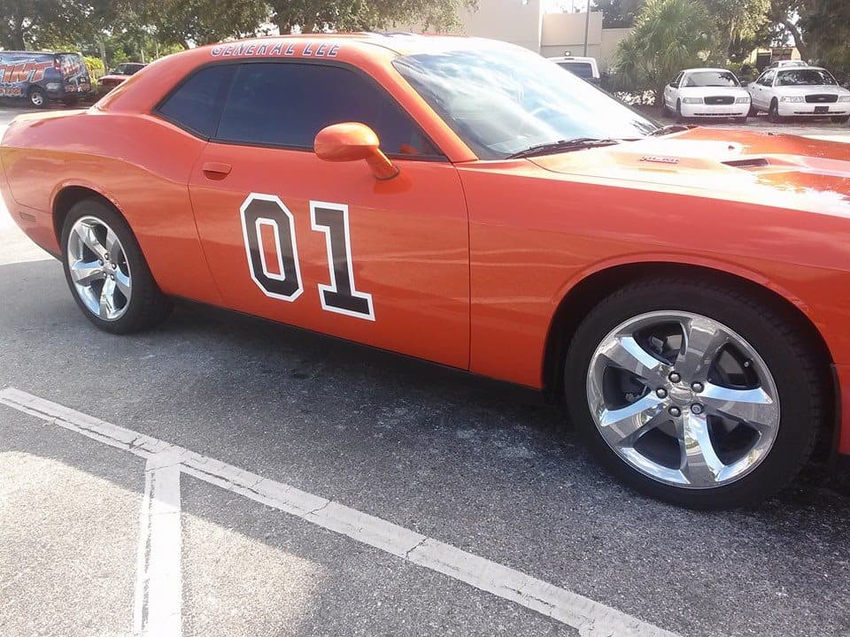 Custom vinyl graphics on custom vehicle by ATD Suncoast