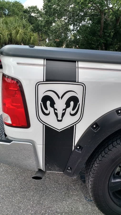 Custom vinyl graphics on custom vehicle by ATD Suncoast