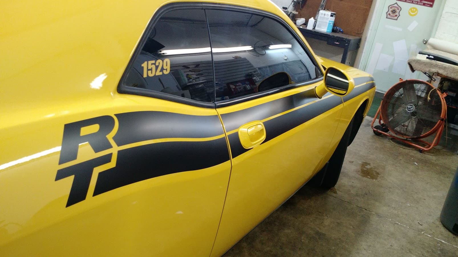 Custom vinyl graphics on custom vehicle by ATD Suncoast