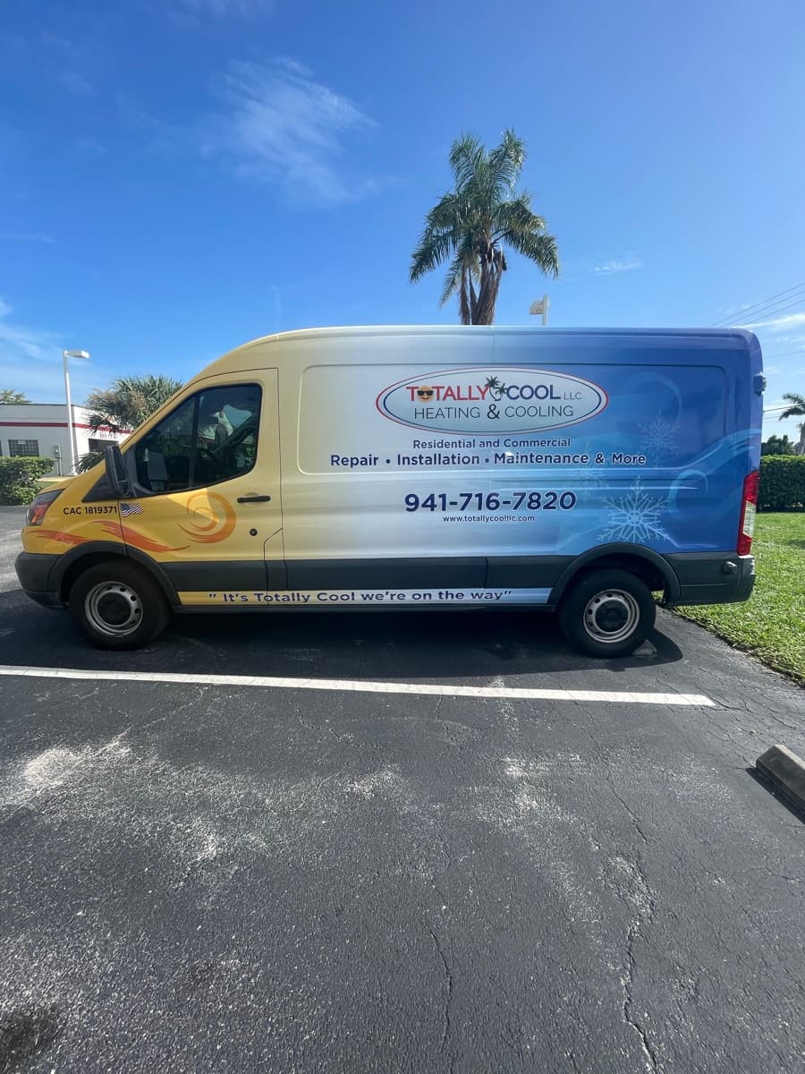 Fleet vehicle graphics Totally Cool Heating van wrap by Auto Trim Design