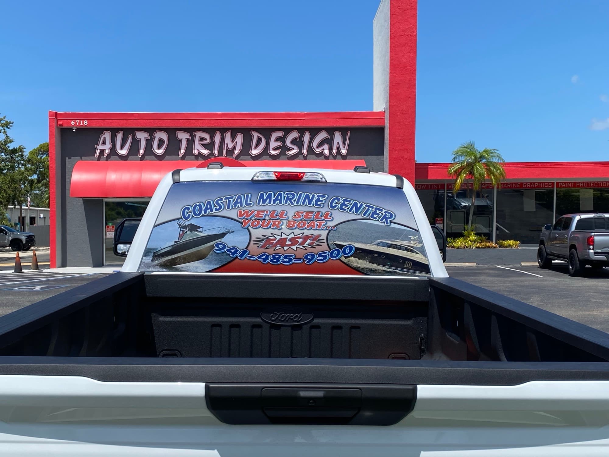 Coastal Marine Center rear window perf graphics at Auto Trim Design