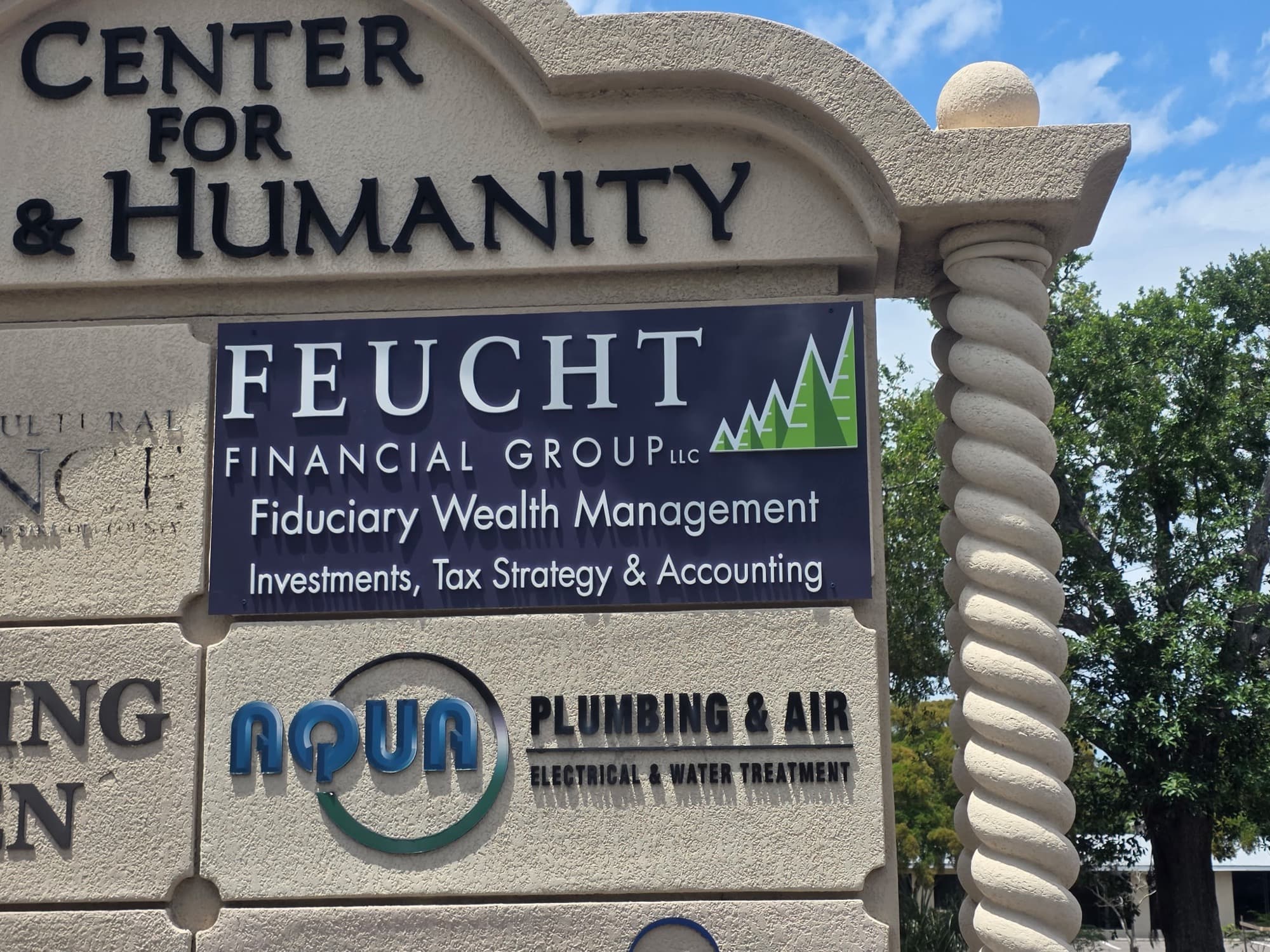 Feucht Financial Group and Aqua Plumbing monument sign panels by ATD
